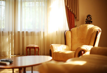 Empty sitting room and armchair